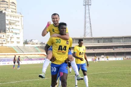 Players of Sheikh Jamal Dhanmondi Club Limited celebrating after scoring a goal against Brothers Union Club in their match of the Bangladesh Premier League Football at the Bangabandhu National Stadium on Thursday.