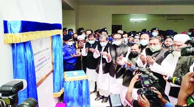 Home Minister Asaduzzaman Khan along with local MPs and Senior Police officials offer prayer while inaugurating the newly built Chattogram district SP office building at Solashahar circle in the port city yesterday morning.