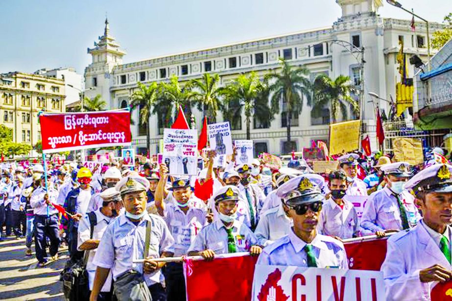 Myanmar railway workers protesting in Yangon on Feb 13.
