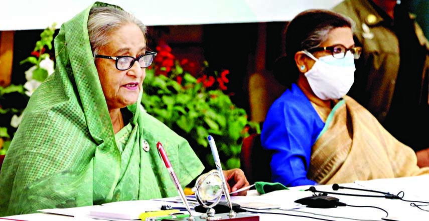 Prime Minister Sheikh Hasina speaks at a press conference on ' Bangladesh's overcome in developing countries' as per UN's recommendation from Ganobhaban virtually on Saturday marking birth centenary of Bangabandhu and golden jubilee of the Independenc