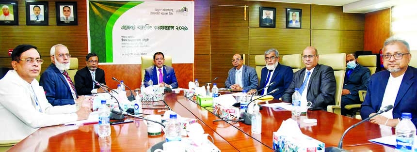 Farman R. Chowdhury, Managing Director and CEO of Al-Arafah Islami Bank Limited, presiding over the 'Agent Banking Conference' at the bank's head office in the city on Saturday. Shabbir Ahmed, Md. Shafiqur Rahman, Syed Masodul Bari, Md. Mahmudur Rahman