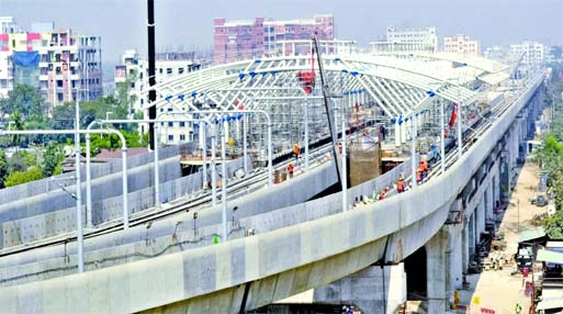 The first phase of Bangladesh’s first metro rail project from Uttara to Agargaon is visible as the last viaduct of this part was installed on Sunday.