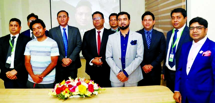 MA Razzak Khan Raj, Chairman of Minister Group, poses for a photo after unveiling the TVC on Bangabandhu's birth centenary and 50th anniversary of Bangladesh's independence at the company's head office in the city on Monday. Golam Shahriar Kabir, Execu