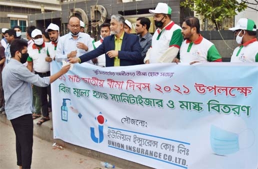 Marking National Insurance Day 2021, Managing Director & CEO along with other executives of Union Insurance Company Limited, distributing free hand sanitizer and mask to common people in front of the company's head office in city's Purana Paltan area on