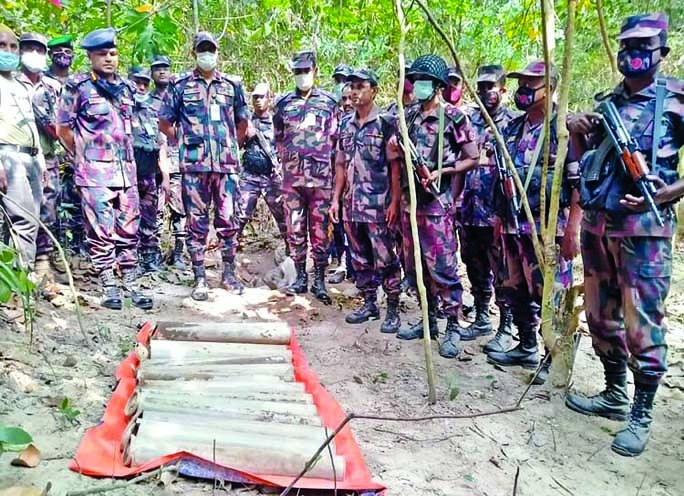 BGB personnel recover anti-tank rocket shells from the forest of Satchhori Jatiya Uddyan in Habigonj on Wednesday.