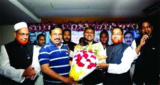 Nizam Uddin Hazari, MP, General Secretary of Feni District Awami League, was greeted with flower bouquet by the party's Sadar Upazila President Karim Ullah and during a meeting on Monday.