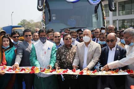 Industries Minister Nurul Majid Mahmud Humayun along with State Minister for Disaster Management and Relief Dr Md Enamur Rahman, inaugurating the production activities of IFAD Autos factory at Dhamrai in Manikgonj on Thursday as chief guest. Benjir Ahmed,