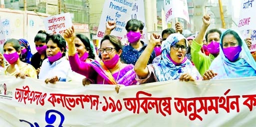 National Workers Unity centre bring out a procession chanting various demands of women marking the International Women’s Day at Topkhana Road in the capital on Friday.