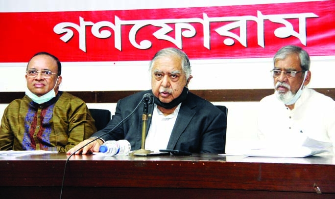 Ganoforum President Dr. Kamal Hossain speaks at a press conference at the Jatiya Press Club on Saturday.