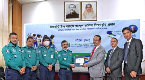 Md. Quamrul Islam Chowdhury, Managing Director & CEO of Mercantile Bank Limited, handing over the cheques and the certificates of "Mercantile Bank-Abdul Jalil Education Scholarship- 2019" to Krishna Pada Roy, Additional Police Commissioner of Dhaka Metr