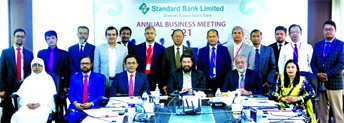 Khondoker Rashed Maqsood, Managing Director & CEO of Standard Bank Limited (SBL), poses for photo session with the participants of the bank's "Annual Business Meeting- 2021" at the bank's head office in the city recently. Alkona K. Choudhuri, Head of