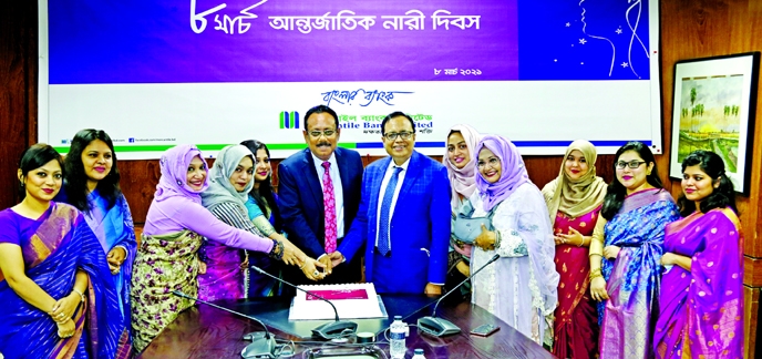 Md. Quamrul Islam Chowdhury, Managing Director & CEO along with the female executives and senior officials of Mercantile Bank Limited, cutting a cake to celebrate the International Women's Day-2021 at the bank's head office in the city on Monday. Mati U