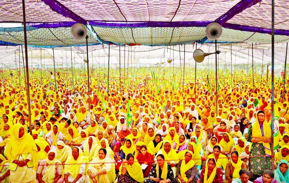 Women farmers attend a protest against farm laws on the occasion of International Women's Day at Bahadurgar near Haryana-Delhi border, India