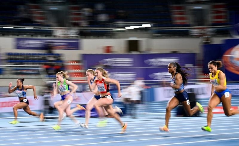 Athletes compete during the women's 60m final at the 2021 European Athletics Indoor Championships in Torun, Poland on Sunday.