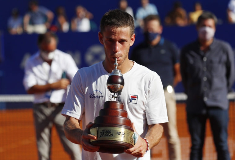 Argentina's Diego Schwartzman celebrates winning the final against Argentina's Francisco Cerundolo with the trophy at Buenos Aires Lawn Tennis Club, Buenos Aires, Argentina on Sunday.