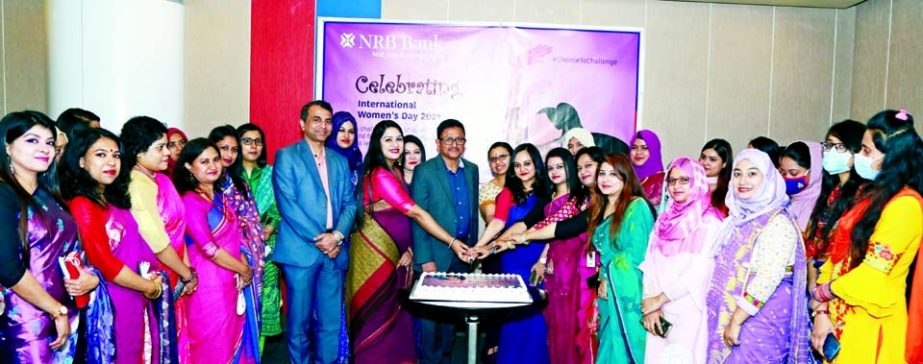 NRB Bank Limited celebrated International Women's Day 2021 with the participation of female colleagues at the bank's head office in the city on Monday by cutting cake. Mamoon Mahmood Shah, Managing Director and CEO while Md Abdul Wadud, DMD and top wome
