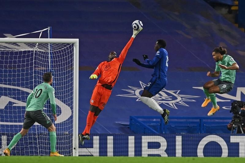 Chelsea's goalkeeper Edouard Mendy makes a save during the English Premier League football match between Chelsea and Everton at Stamford Bridge in London on Monday.