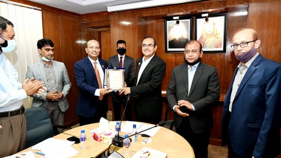 Managing Director of Bangladesh Krishi Bank (BKB) Md. Ali Hossain Prodhania receives the 1st position crest and certificate of the Annual Performance Agreement (APA) for the yearly final evaluation of Financial Institutions Division for the last FY 2019-2