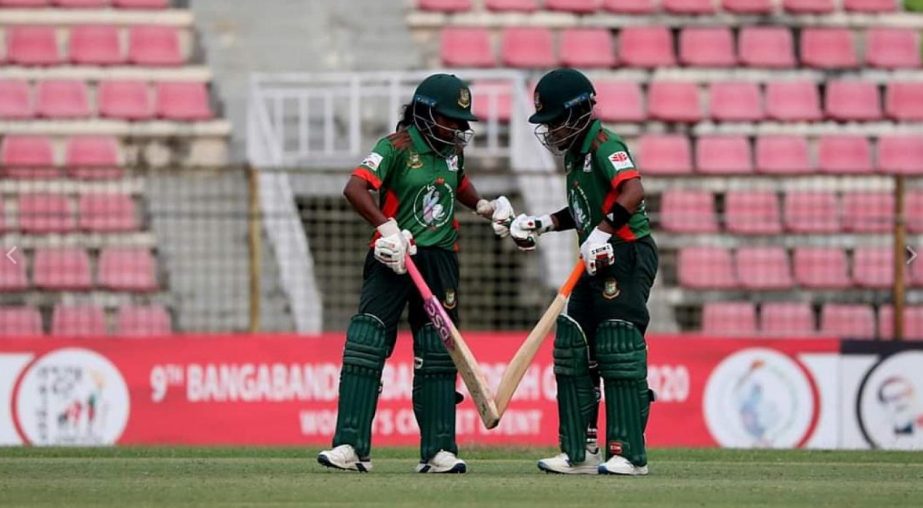 Ritu Moni (left) and Rumana Ahmed of Bangladesh Green toasting during the Women's Cricket Competition of 9th Bangabandhu Bangladesh Games against Bangladesh Red at Sylhet International Cricket Stadium on Wednesday.