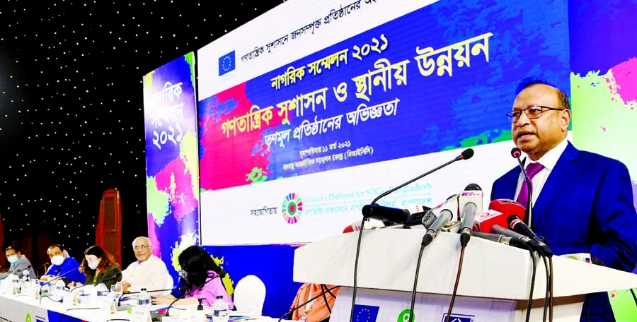 LGRD and Cooperatives Minister Tajul Islam speaks at a discussion on 'Democratic Governance and Local Development: Experience of Grass Root Level Institutions' at Bangabandhu International Conference Center in the city on Thursday.
