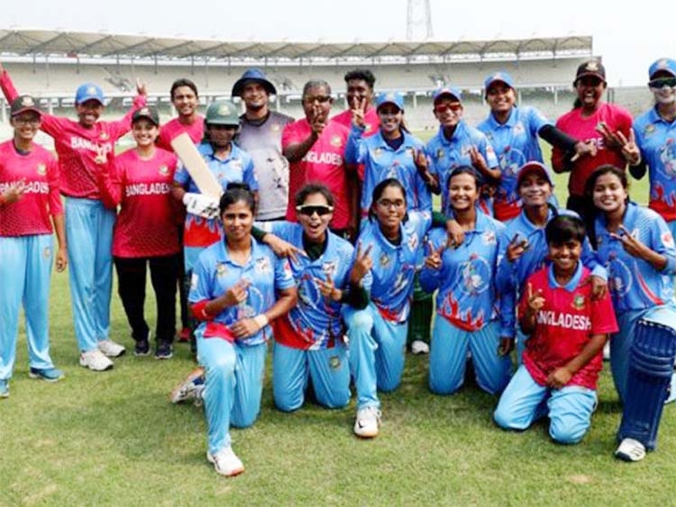 Members of Bangladesh Blue women’s team pose for a photo session after won gold medal in the women's cricket discipline of the Bangabandhu 9th Bangladesh Games at Sylhet International Cricket Stadium on Friday.