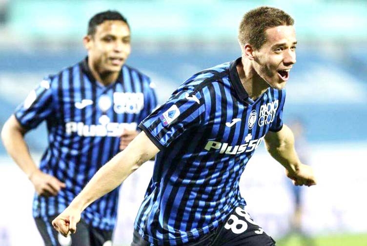 Atalanta's Mario Pasalic (front) celebrates after scoring during the Italian serie A match against Spezia at the Gewiss stadium in Bergamo, Italy on Friday.