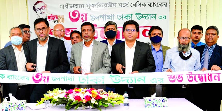 Md. Rafiqul Islam along with Md. Razib Parvez, Directors of BASIC Bank Limited, inaugurating the bank's 3rd sub-branch at Mohammadpur in the capital on Sunday. Ahmed Hossain, Managing Director (Additional Charge), other senior executives of the bank and