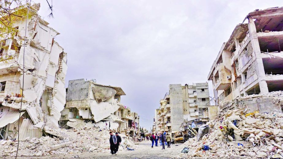 Destruction following an airstrike in the jihadist-held city of Idlib, Syria.