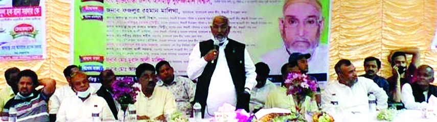 Freedom fighter Nuruzzaman Biswas, MP speaks at a bi-annual conference of Sara Union Krishka League held on the wood mill premises of Ishwardi's Baria on Monday.