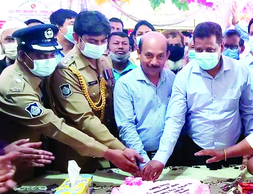 Mohammad Wahiduzzaman, District Commissioner of Feni inaugurates the celebration program of birth centenary of Father of the nation Bangabandhu Sheikh Mujibur Rahman by cutting a cake organized by the 250 Bed General Hospital Authority of Feni at the hosp