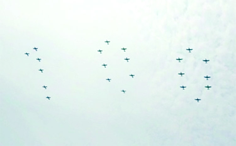 Different types of aircraft of Bangladesh Air Force displays wonderful fly past by making '100' in the air on the occasion of the Birth Centenary of the Father of the Nation Bangabandhu Sheikh Mujibur Rahman on Wednesday.