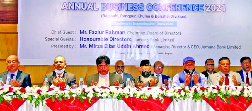 Mirza Ilias Uddin Ahmed, Managing Director and CEO of Jamuna Bank Ltd, presiding over the bank's annual business conference at a hotel in Bagura recently. Jamuna Bank Foundation Chairman Noor Mohammad, Risk Management Committee Chairman A K M Mosharraf H