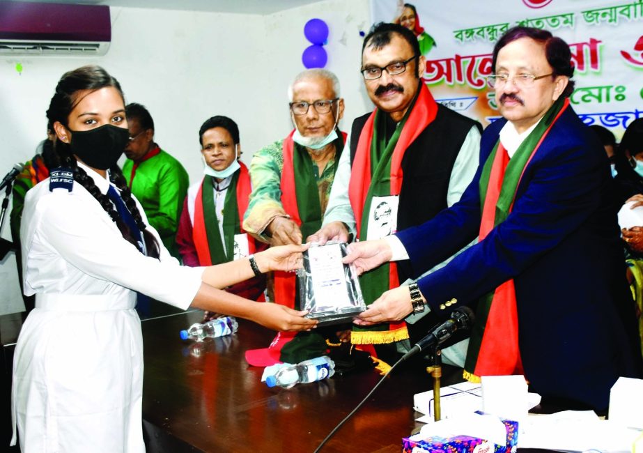 Chairman of Bangladesh Satellite Company Limited Dr Shahjahan Mahamud hands over citation among the winners of eassy competition organised on the occasion of birth centenary of Bangabandhu and golden jubilee of the Independence by National Freedom Fighter