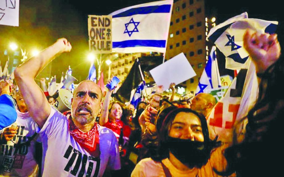 Protesters participate in a weekly demonstration against Israeli Prime Minister Benjamin Netanyahu's alleged corruption and his handling of the coronavirus disease (COVID-19) crisis, ahead of the March 23 general election, in Jerusalem.