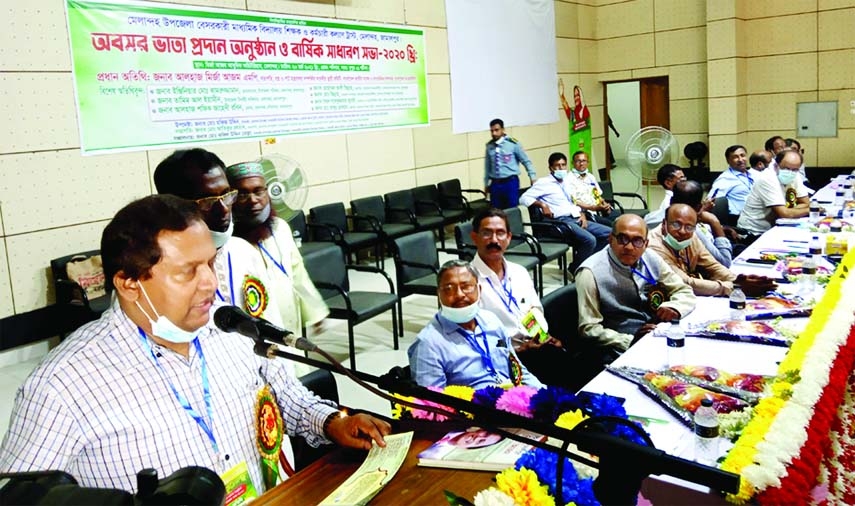 Mirza Azam, MP speaks at a program organized to distribute pension money of non-government teachers at Melandaha, Jamalpur on Sunday.