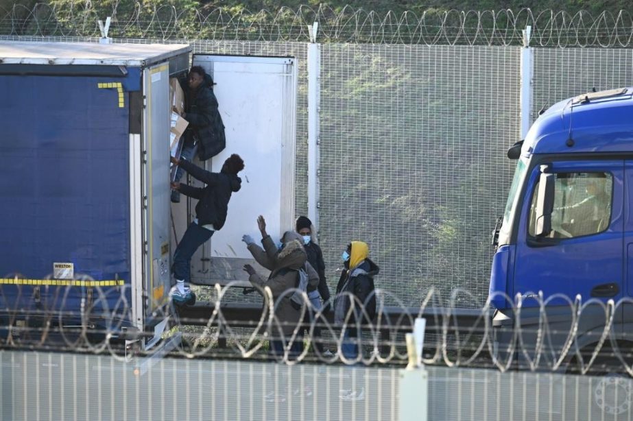 Some migrants try to get from France to Britain in the backs of lorries.