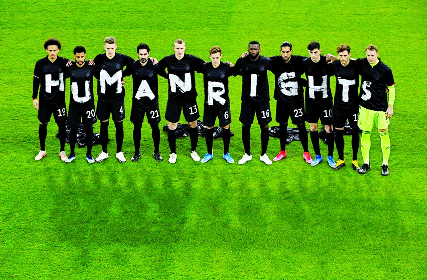 Germany players pose for a photo displaying a Human Rights message on their t-shirts before the match against Iceland on Friday.