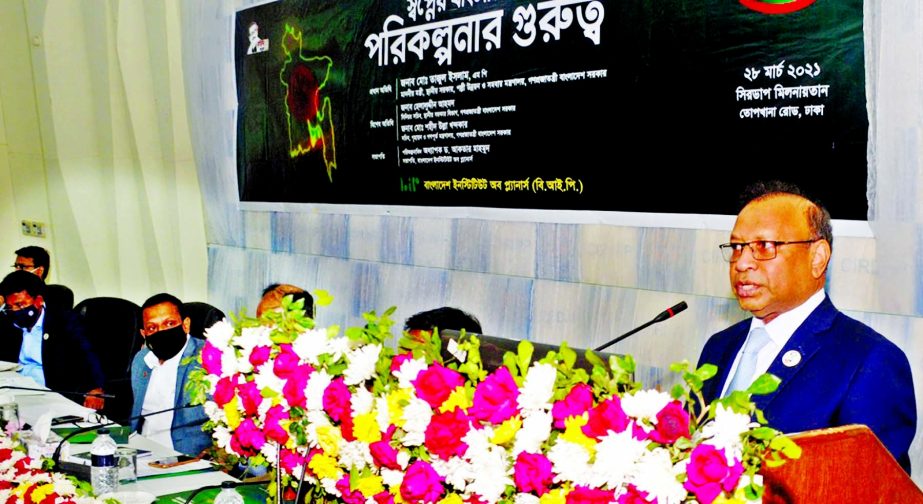 Local Government, Rural Development and Co-operatives Minister Md. Tajul Islam speaks at a seminar arranged by Bangladesh Institute of Planners at CIRDAP auditorium in the capital on Sunday.