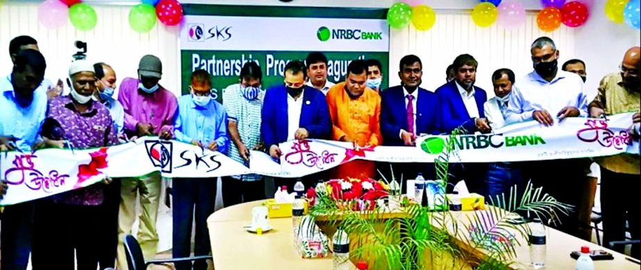S M Parvez Tamal, Chairman of NRBC Bank Limited, inaugurating 10 agent banking branch of the bank at different areas in Gaibandha district recently. Rasel Ahmed Liton, Founder and Chief Executive of SKS Foundation and local elites were present.