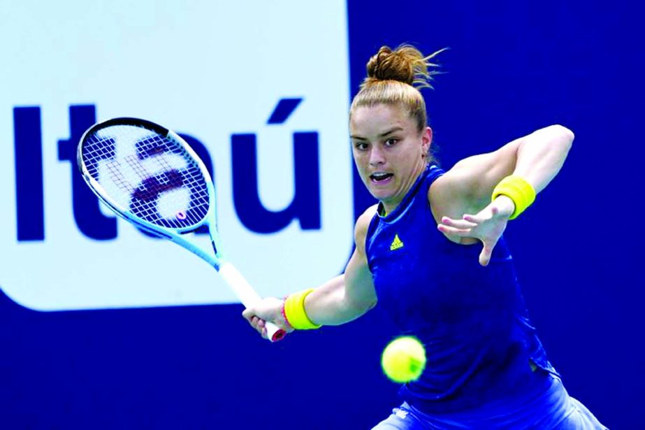 Maria Sakkari of Greece, hits a return to Naomi Osaka (not in picture) of Japan during the quarterfinals of the Miami Open tennis tournament in Miami Gardens on Wednesday.