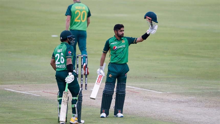 Pakistan's captain Babar Azam (right) celebrates after scoring a century (100 runs) during their first ODI against South Africa at SuperSport Park in Centurion on Friday.