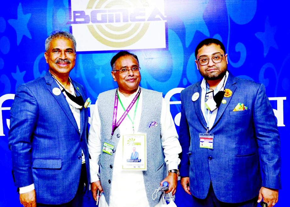Newly elected BGMEA President Faruque Hassan, former BGMEA President Kutubuddin Ahmed and newly elected Director and MD of Sheltech Group Tanvir Ahmed pose for a photo session at Radisson Hotel in the city on Tuesday. n NN photo