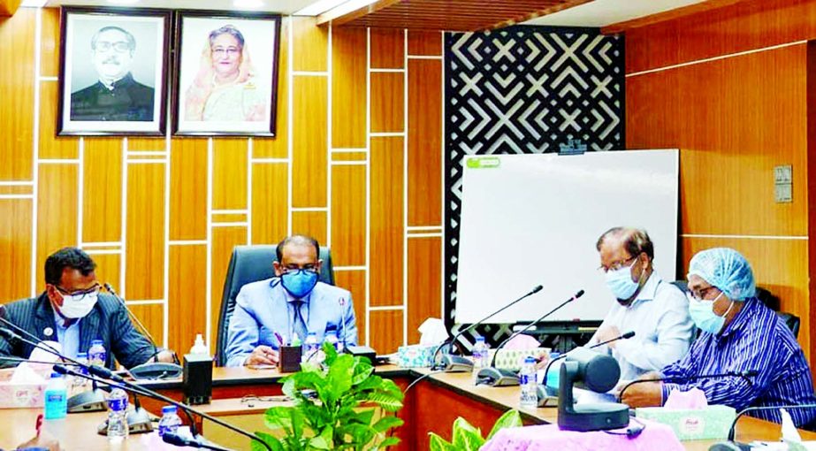Land Minister Saifuzzaman Chowdhury presides over the meeting on leasing of government jalmahal through video conference at the seminar room of the ministry on Tuesday.