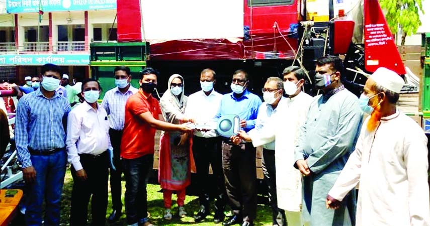 Deputy Director of Sylhet Agriculture Extension Department Mohd. Salah Uddin distributes equipments among the farmers of Gopalganj upazilla recently.