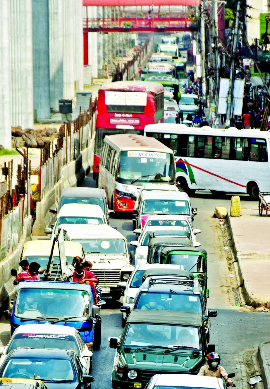 The city dwellers witness traffic congestion on Wednesday in different city parts including Farmgate after the government relaxed sanction barely two days after it imposed on public buses with immediate effect.