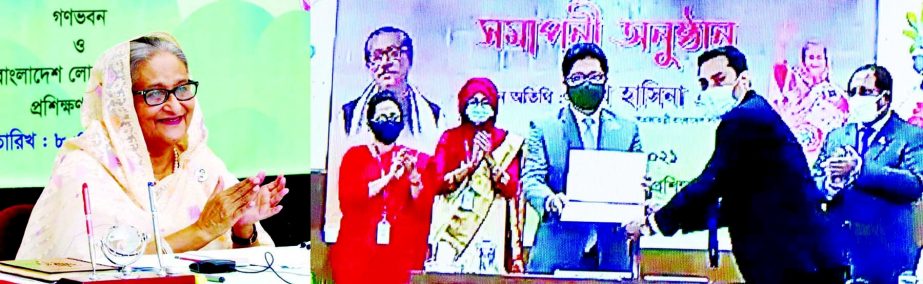 On behalf of Prime Minister Sheikh Hasina State Minister for Public Administration Farhad Hossain hands over certificates among the trainees in the concluding ceremony of the 71st fundamental training course at Bangladesh Public Administration Training C