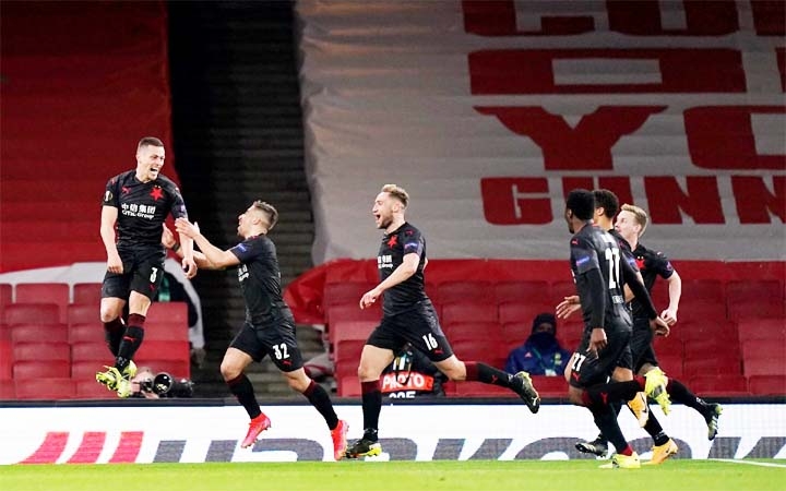 Players of Slavia Prague, celebrate their late equaliser against Arsenal in their Europa League quarter-final match on Thursday.