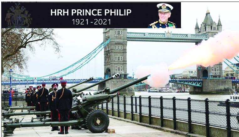 Members of the Honourable Artillery Company fire during a 41-round gun salute for Prince Philip from the wharf at the Tower of London on Saturday.