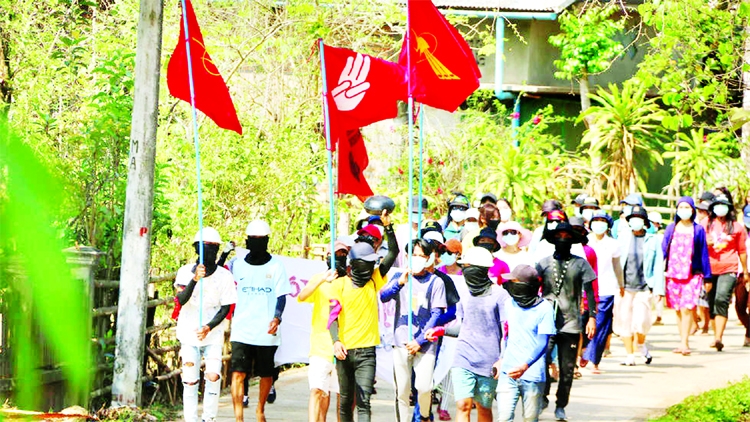 Protesters march against the military coup in Launglone township in Myanmar's Dawei district.