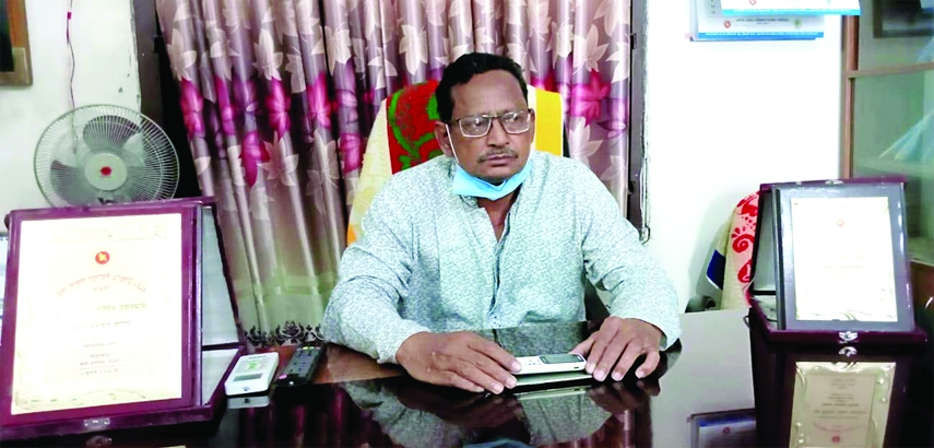 Munjurul Alam Munju, Raigaon UP Chairman of Mohadevpur upazila recently receives Local Government Award as the top person in the district in settling cases through village court trials.